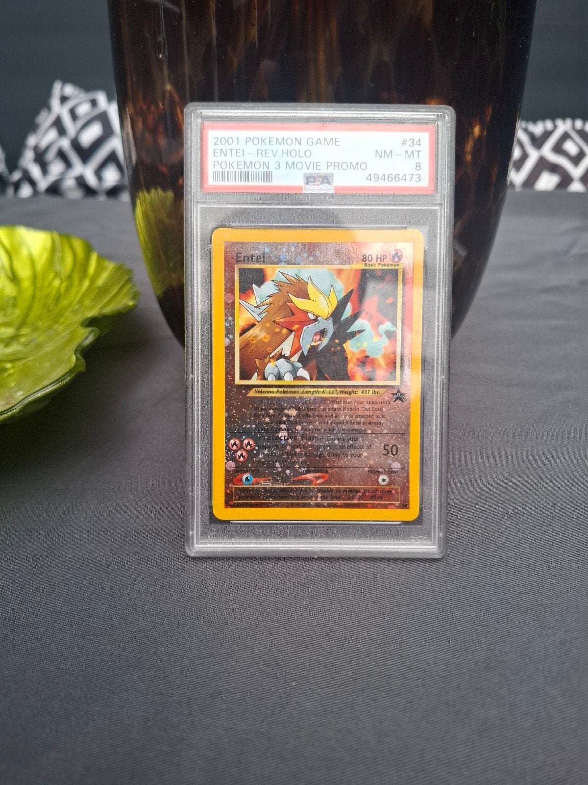 PSA 8 Entei Rev. Holo Pokémon 3 Movie Promo #34, Ophalen, Zo goed als nieuw, Losse kaart, Foil
