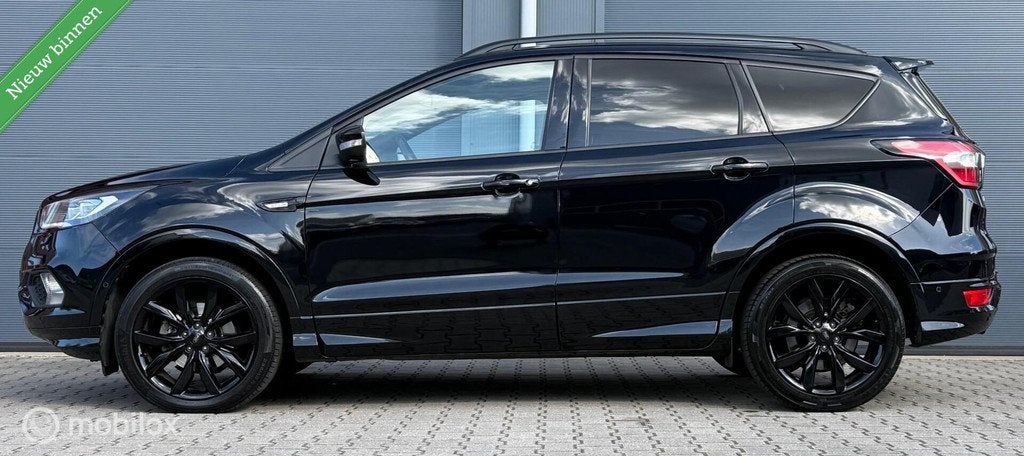 Ford Kuga 1.5 EcoBoost ST Line Trekhaak/Winterpack/LED/Clima, Voorwielaandrijving, 4 cilinders, Zwart, 14 km/l