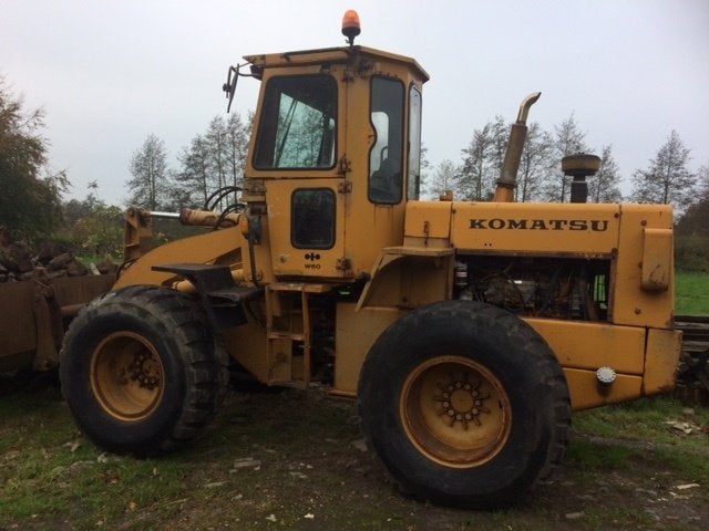 Dikke Komatsu 6-cilinder shovel met bak en lepels, Gebruikt, Tot 2500, 120 tot 160 Pk, Ophalen