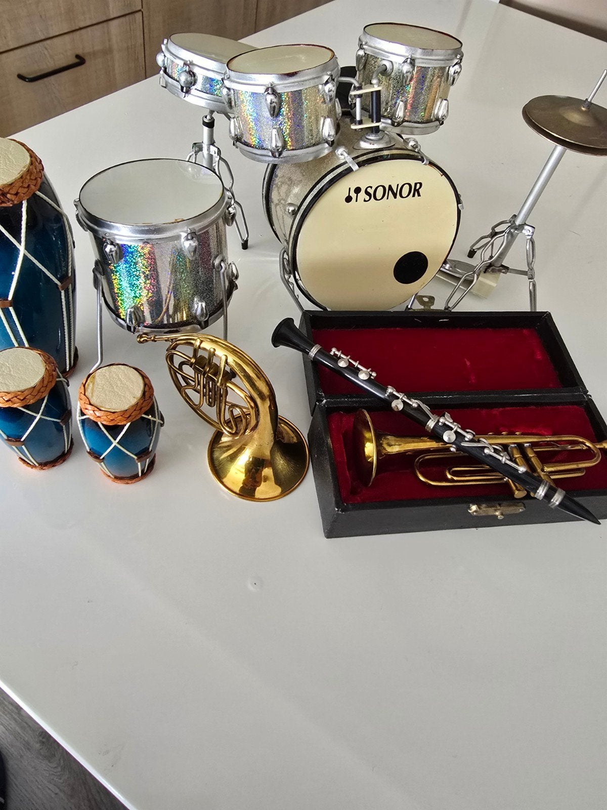 Mini muziekinstrumenten, Verzenden