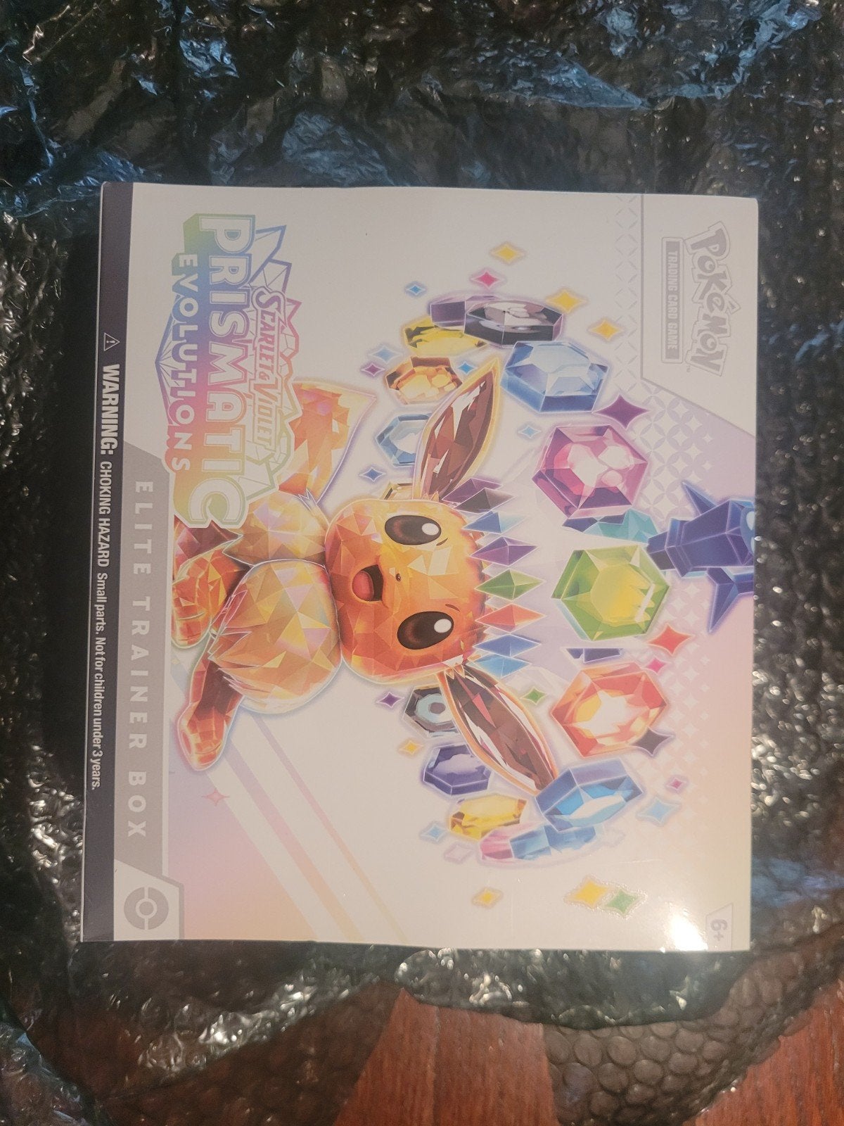 Pokémon ETB Prismatic evolutions, Ophalen of Verzenden, Zo goed als nieuw