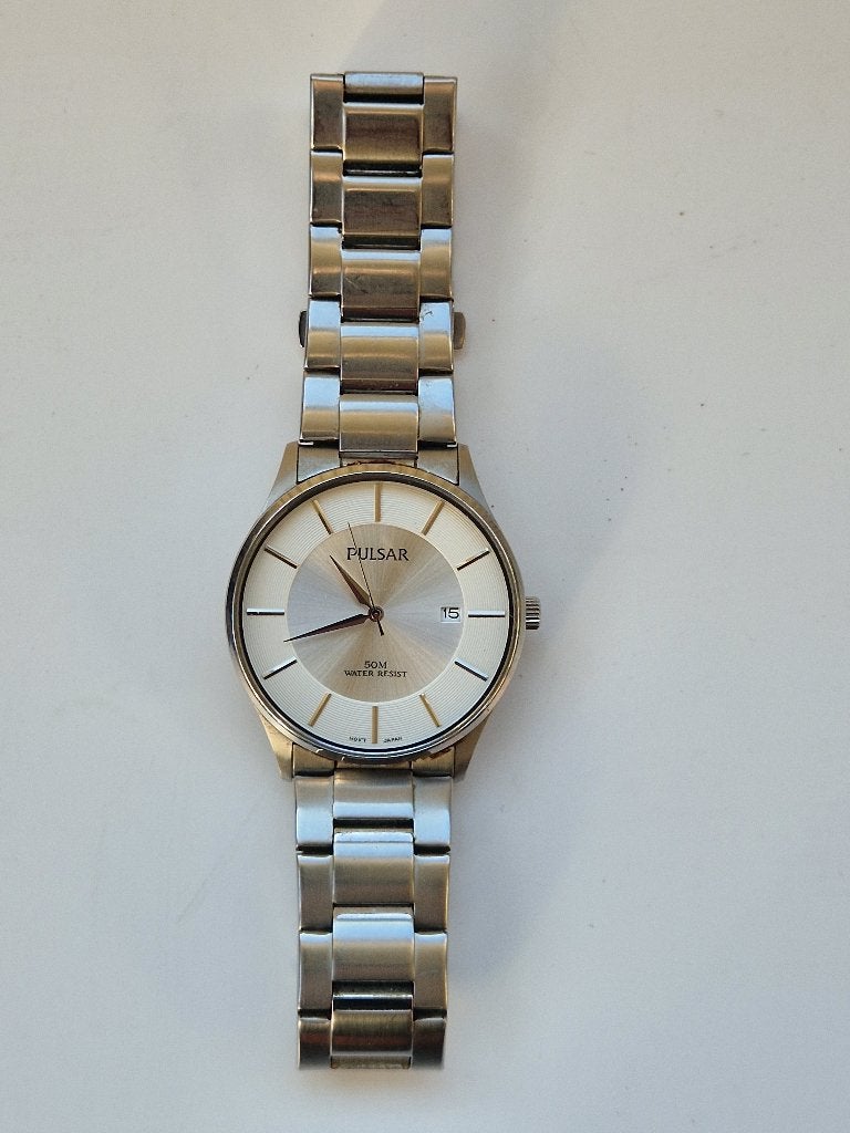 Zilverkleurig Pulsar heren Quartz horloge., Ophalen of Verzenden, Zo goed als nieuw, Staal, Overige merken