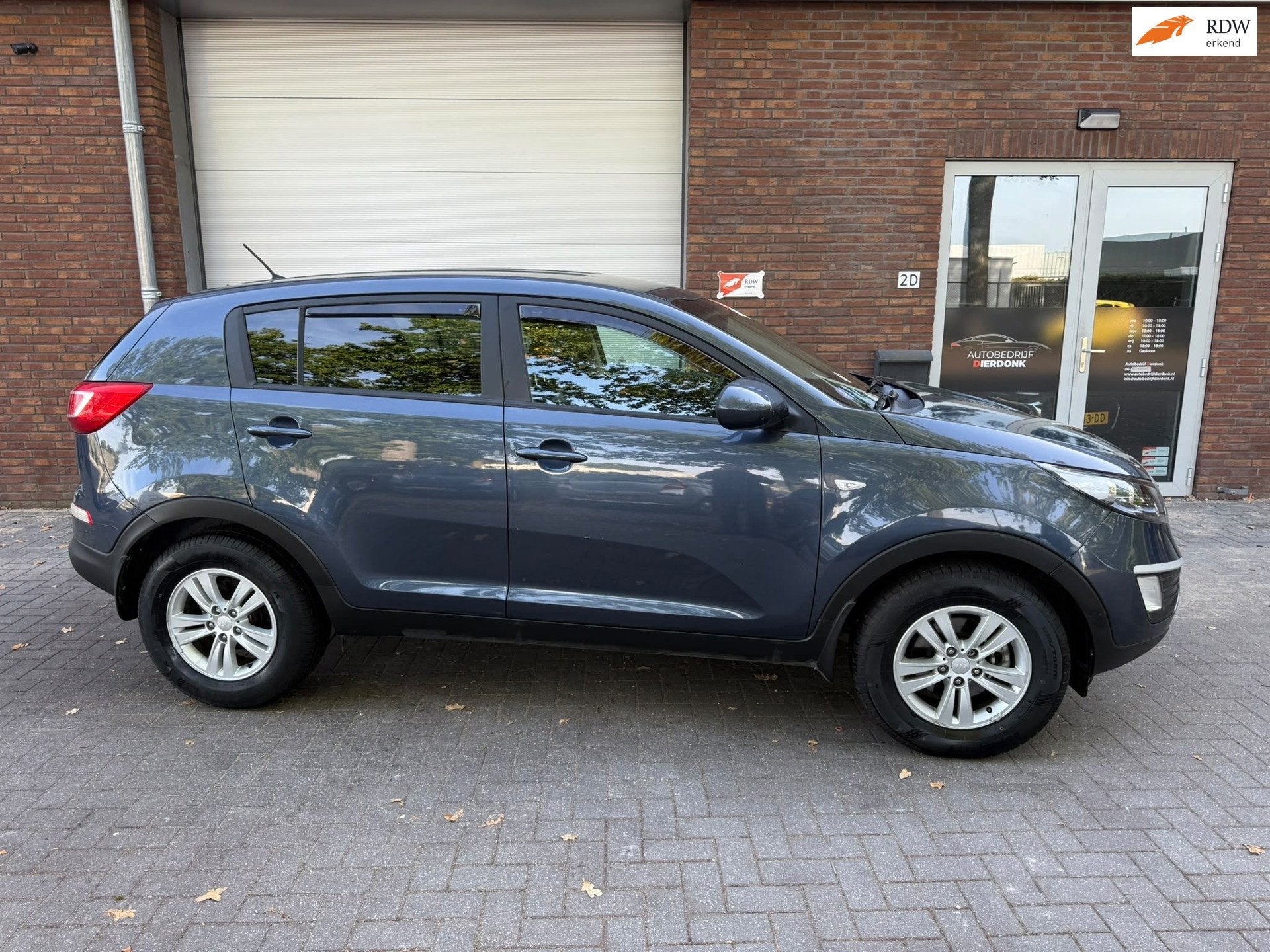 Kia Sportage 2.0 X-ecutive|AUTOMAAT|AIRCO|NIEUWE APK, Auto's, Euro 5, Stof, Gebruikt, Zwart
