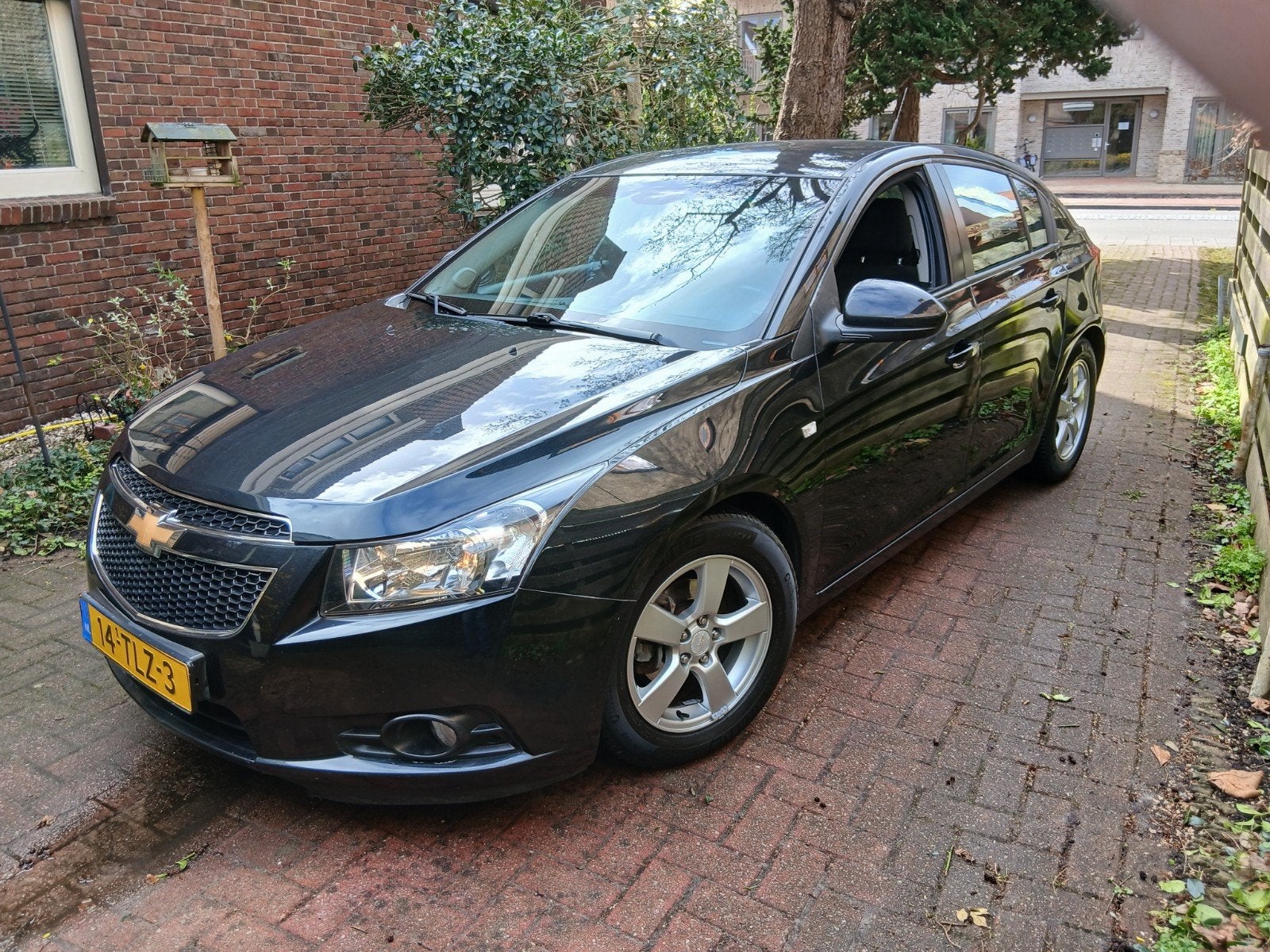 Chevrolet Cruze 1.6 83KW 2012 Zwart, Auto's, Voorwielaandrijving, 1280 kg, Zwart, 4 cilinders