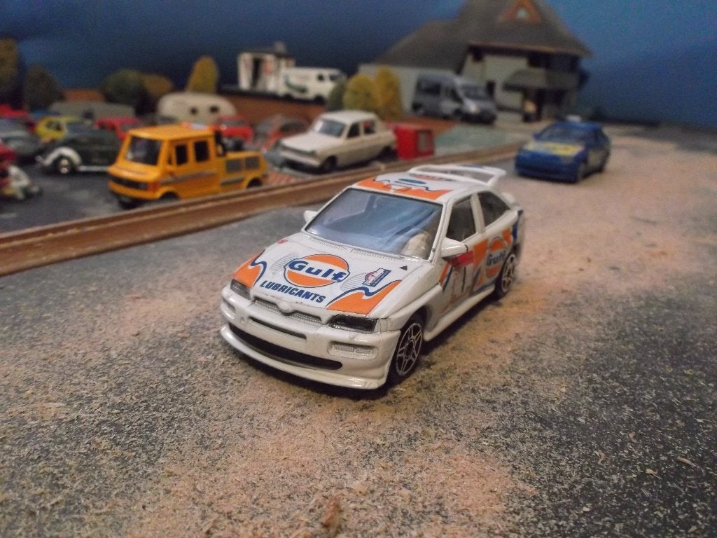 1:43 Escort Cosworth WRC - Bburago Gulf Racing #2, Ophalen of Verzenden, Gebruikt, Auto, Overige merken