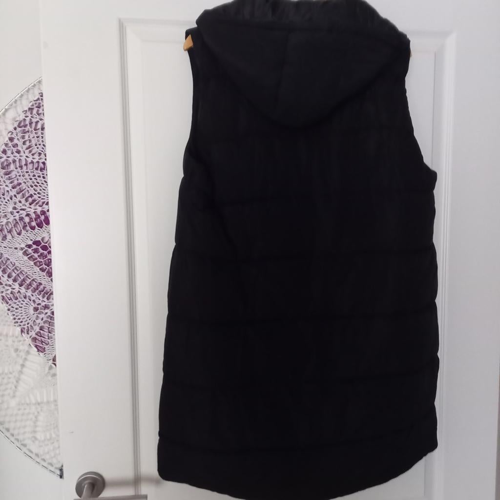 Bodywarmer lang zwart  nieuw  mast l/xl, Kleding | Dames, Bodywarmers, Ophalen of Verzenden, Nieuw, Maat 46/48 (XL) of groter