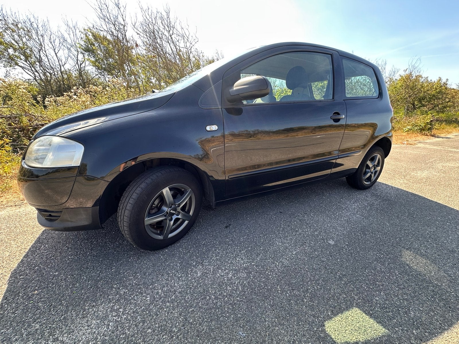 Volkswagen Fox 1.4 55KW 2006 Zwart, Auto's, Voorwielaandrijving, 15 km/l, 4 cilinders, 4 stoelen
