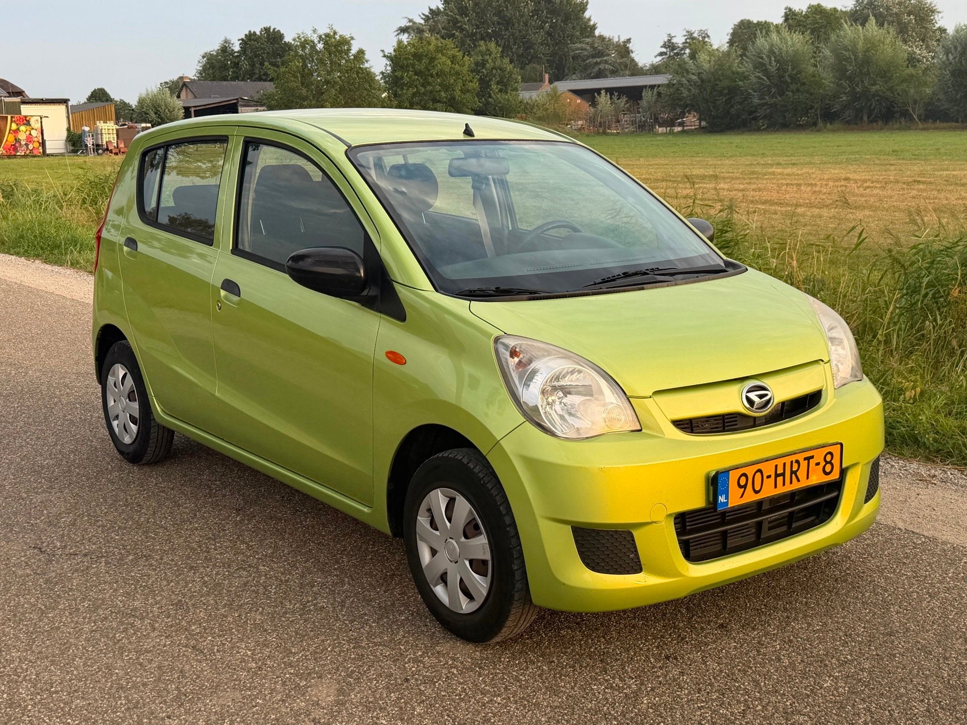 Daihatsu Cuore 1.0 Trend APK 02-2027 Airco NAP, Voorwielaandrijving, Stof, Zwart, 18 €/maand