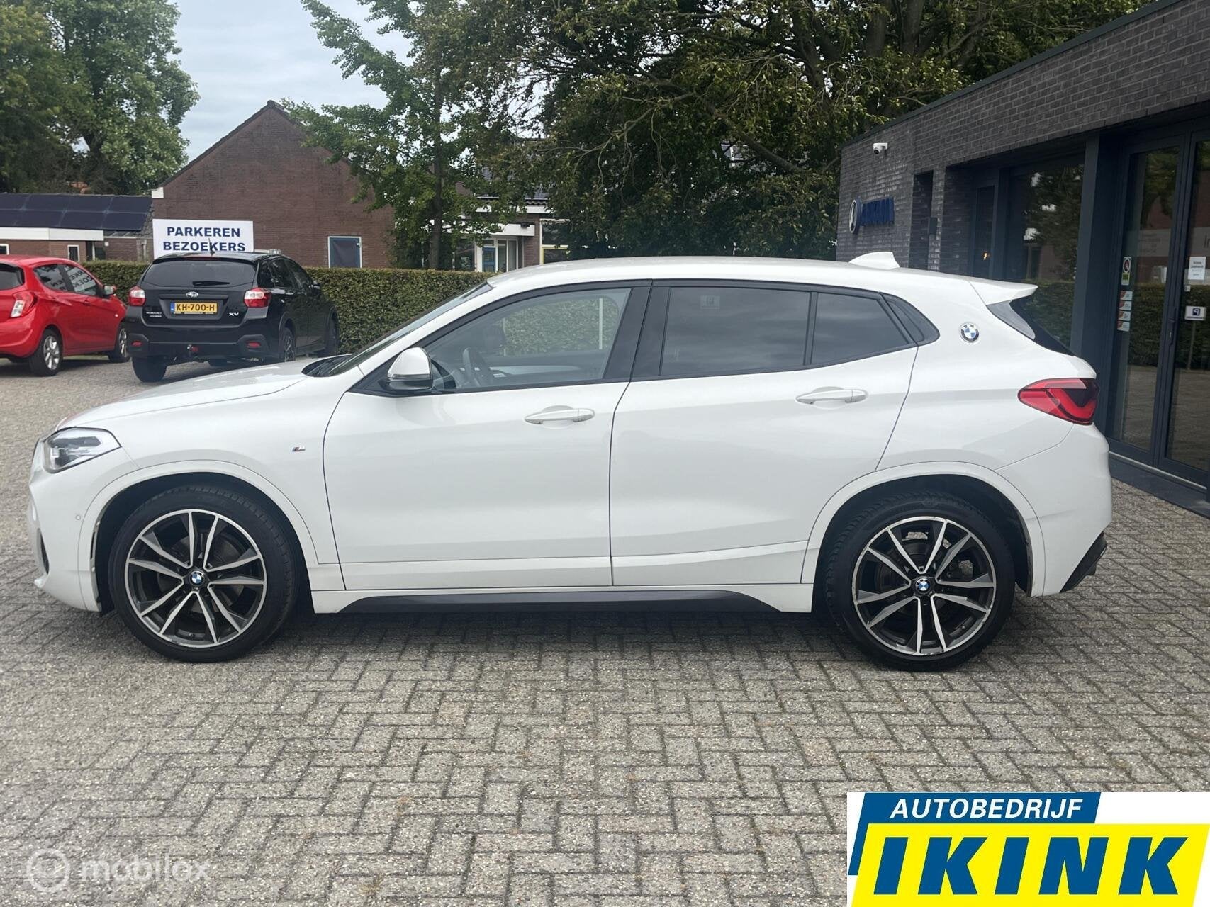 BMW X2 sDrive18i High Executive Edition, Auto's, Gebruikt, Met garantie (alle), Wit, 3 cilinders