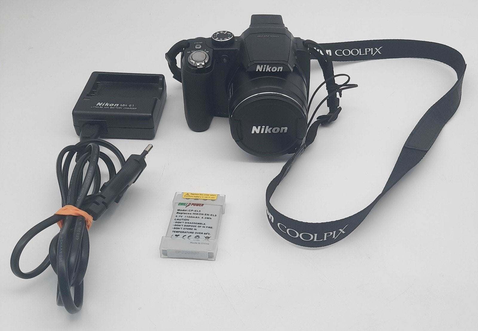 Nikon Coolpix P90 digitale camera inclusief batterijoplader, 12 megapixels, Ophalen of Verzenden, Zo goed als nieuw, Compactcamera