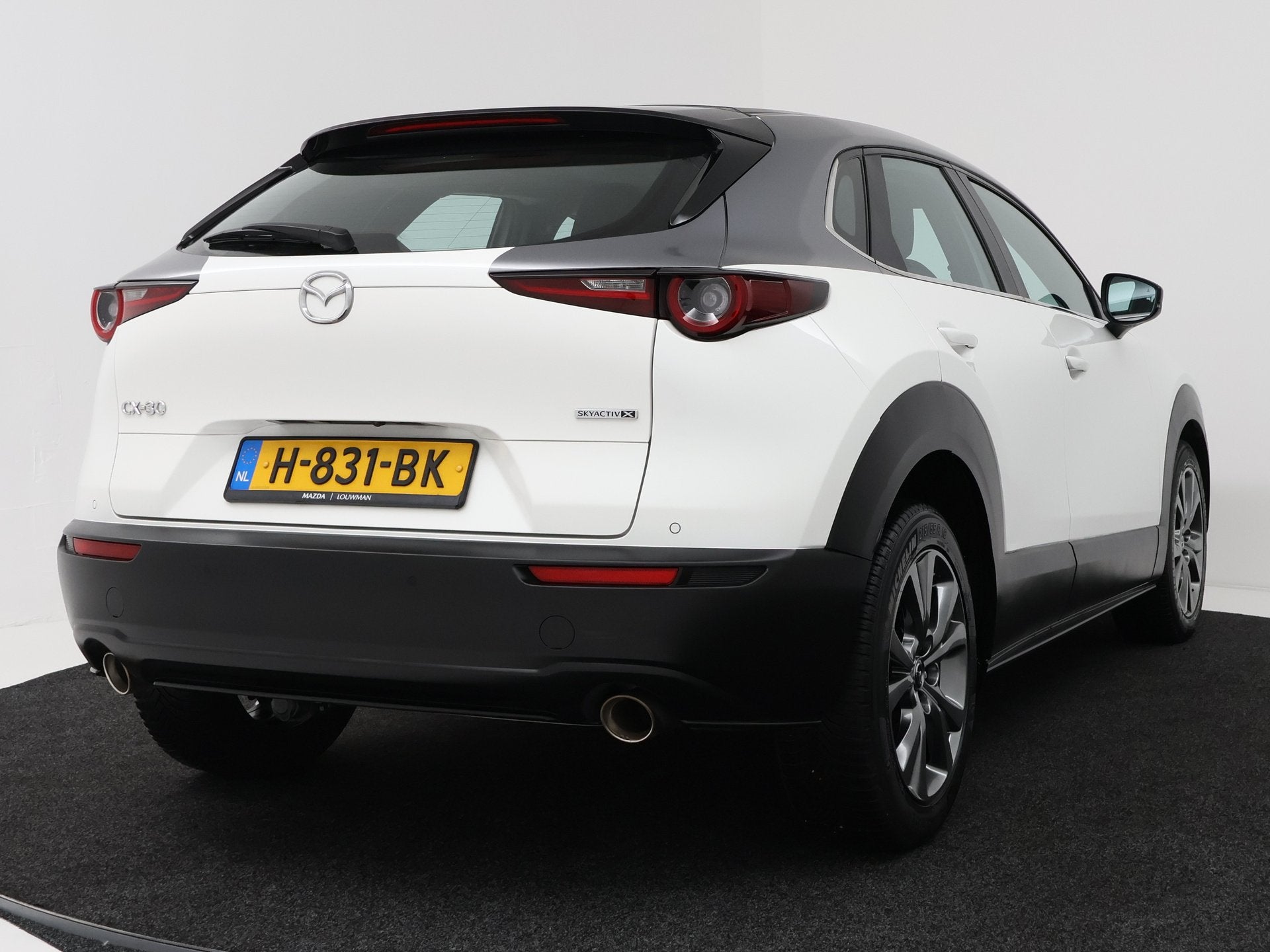 Mazda CX-30 2.0 e-SkyActiv-X M Hybrid Comfort | Unieke kleur, Stof, Gebruikt, 4 cilinders, 179 pk
