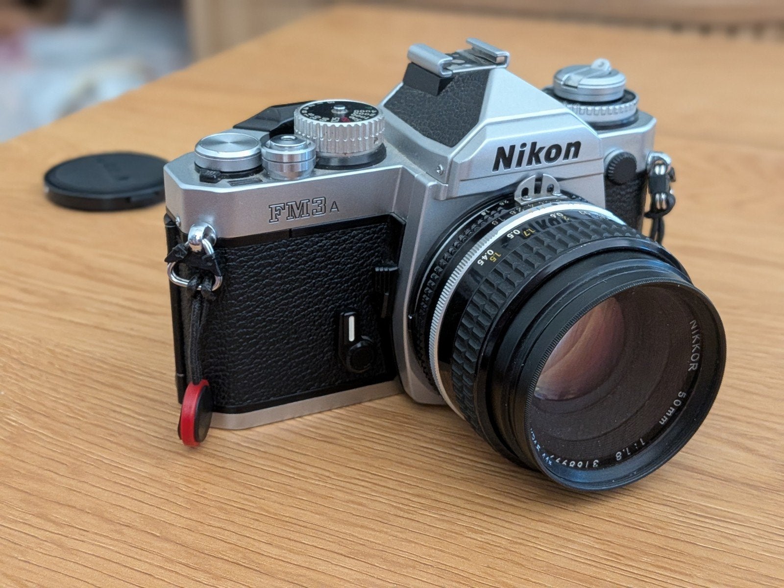Nikon FM3A Chrome + Nikkor 50mm f/1.8 AI-S, Audio, Tv en Foto, Fotocamera's Analoog, Ophalen of Verzenden, Spiegelreflex, Nikon