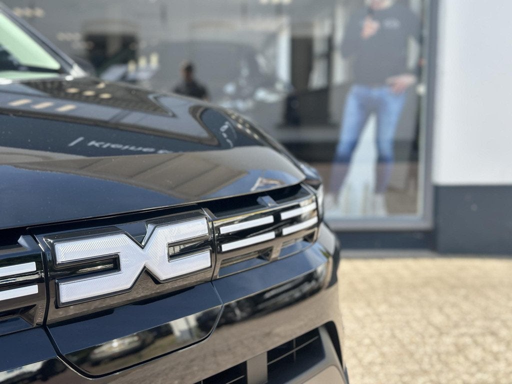 Dacia Spring Expression 65 26.8 kWh | DC lader met een maxim, Auto's, Stof, Gebruikt, 4 stoelen, Zwart