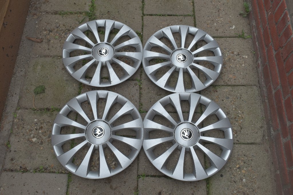 Set van 4 originele wieldoppen Skoda Fabia 15 inch, Auto diversen, Wieldoppen, Ophalen of Verzenden, Gebruikt