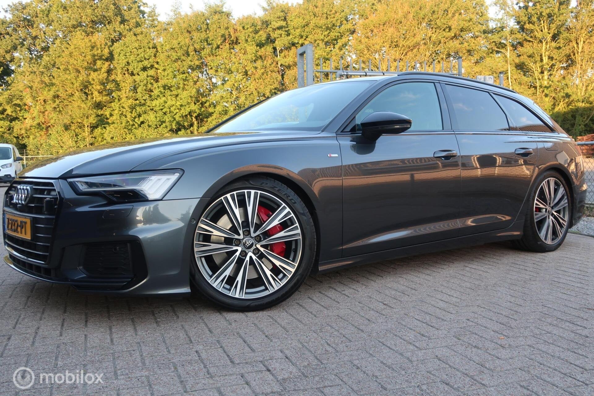 Audi A6 Avant 55 TFSI e quattro Competition TREKHAAK, Auto's, Automaat, Gebruikt, 4 cilinders, Leder en Stof