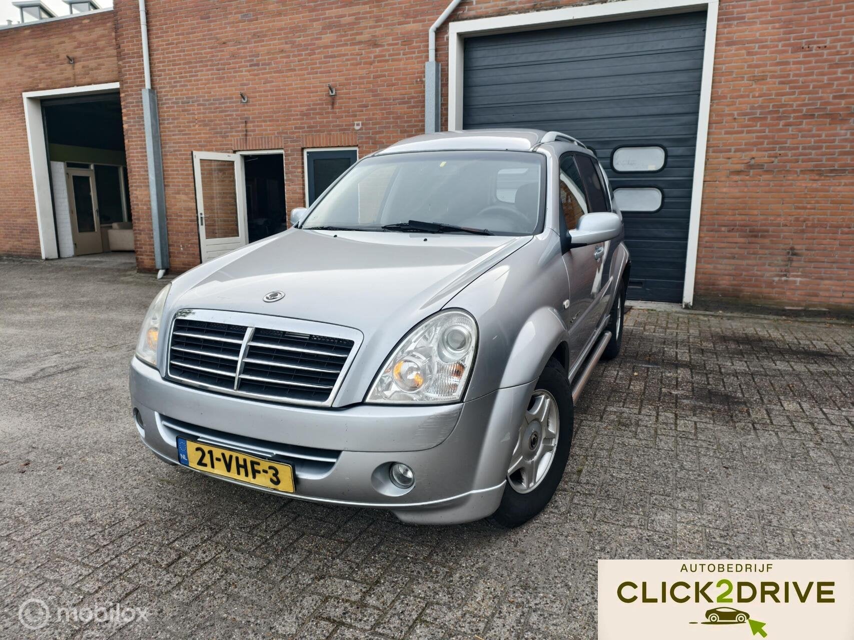 Ssangyong Rexton RX 270 Xdi Dynamic High Roof grijs kenteken, Automaat, Gebruikt, Leder en Stof, 2696 cc