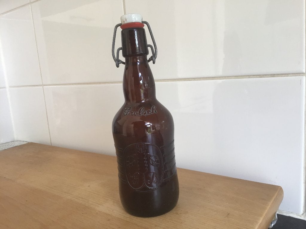 Vintage Bierflesje Bruin Grolsch met beugeldop, Ophalen of Verzenden, Gebruikt, Flesje(s), Grolsch