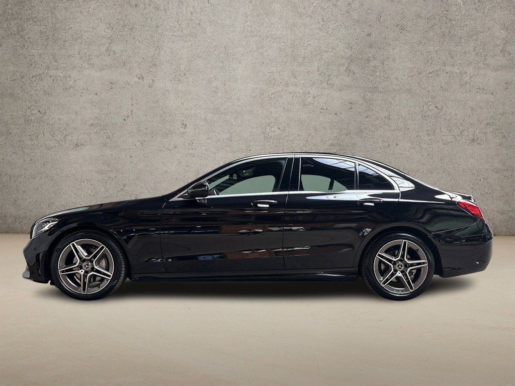 Mercedes-Benz C-Klasse 180 AMG Sport 156Pk Automaat (VIRTUAL, Auto's, Automaat, 12 maanden, Zwart, Sedan