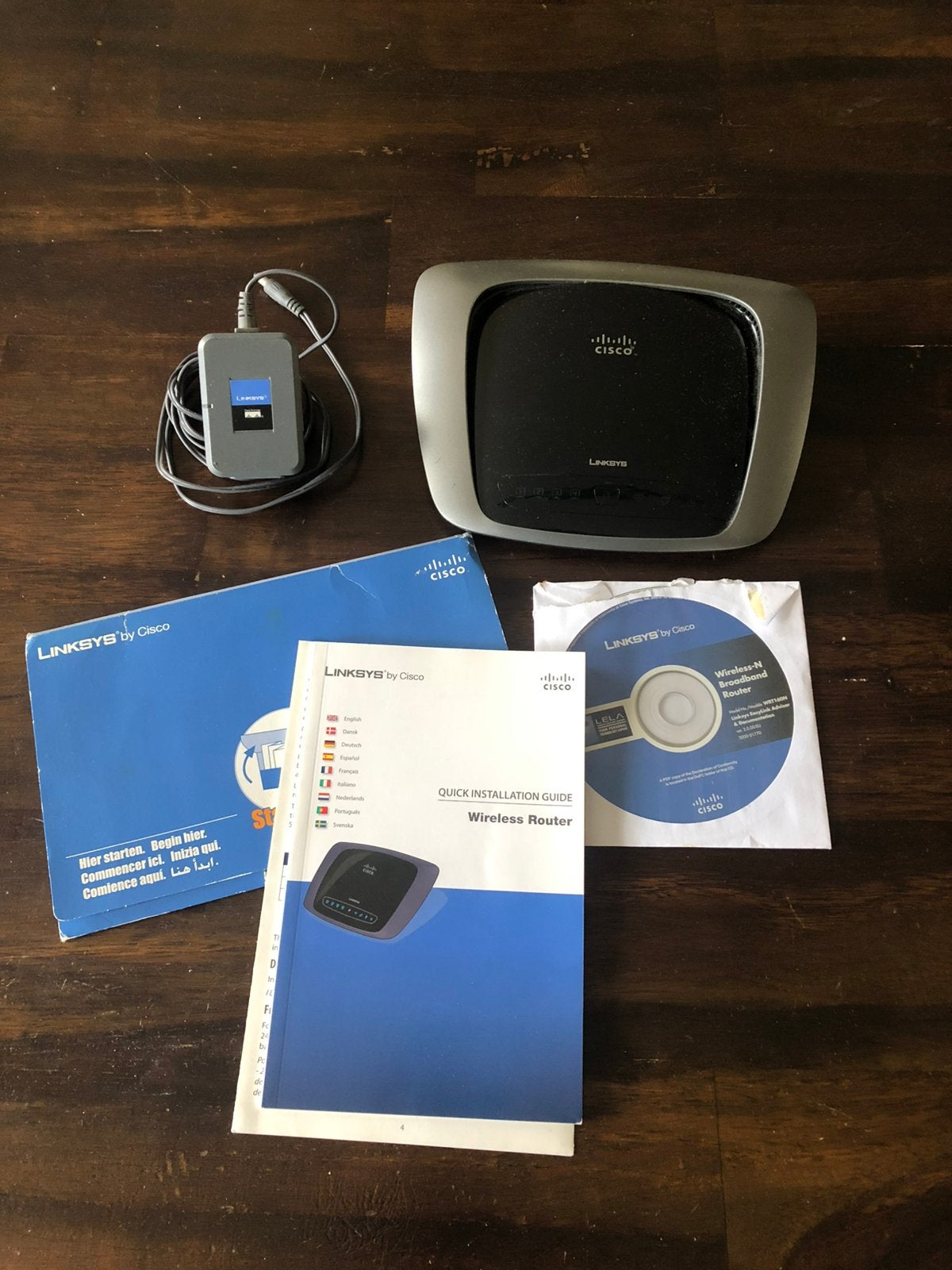 Linksys wireless router incl CD en instructie boekje, Computers en Software, Routers en Modems, Ophalen of Verzenden, Zo goed als nieuw