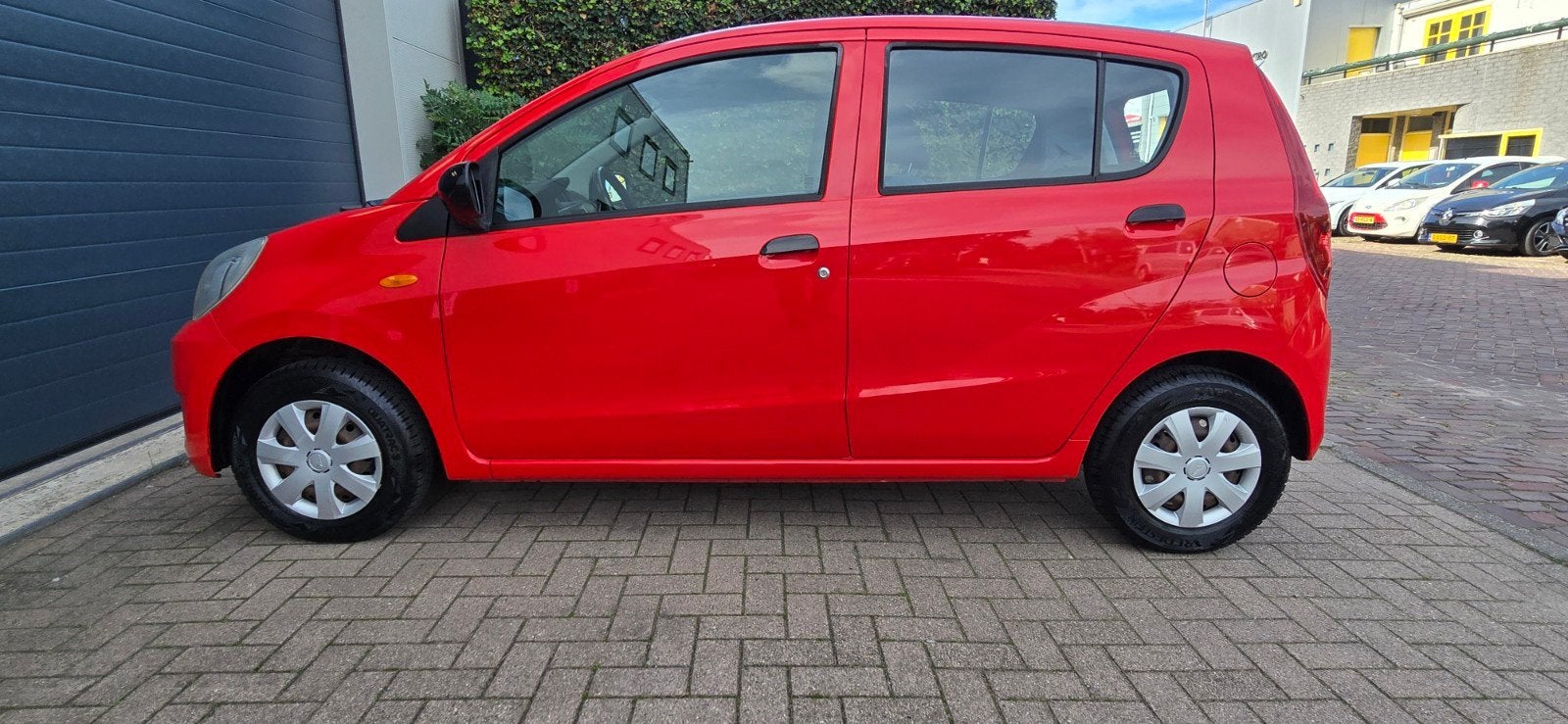 Daihatsu Cuore 1.0 5D 2008 Rood,nw apk, Auto's, Voorwielaandrijving, Dealer onderhouden, Stof, 600 kg