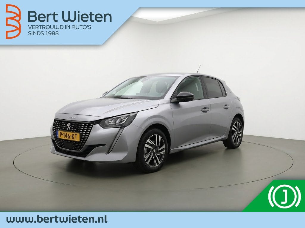 Peugeot 208 1.2 PureTech Allure | Geen import | Cruise | Nav, Auto's, Voorwielaandrijving, 101 pk, Gebruikt, Leder en Stof