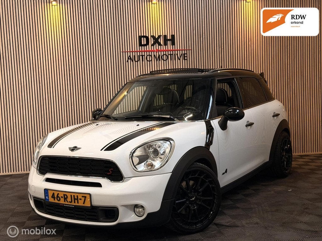 Mini Countryman 1.6 Cooper S ALL4 184pk AUT PANO H/k LEDER, Auto's, Mini, Euro 5, 1380 kg, Gebruikt, Zwart