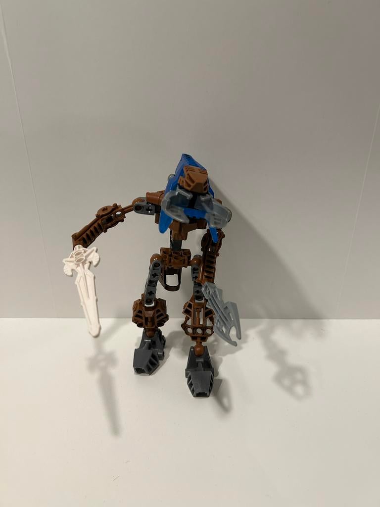 Lego Bionicle figuur - Bruin/Blauw met zwaarden, Kinderen en Baby's, Speelgoed | Duplo en Lego, Zo goed als nieuw, Lego, Complete set
