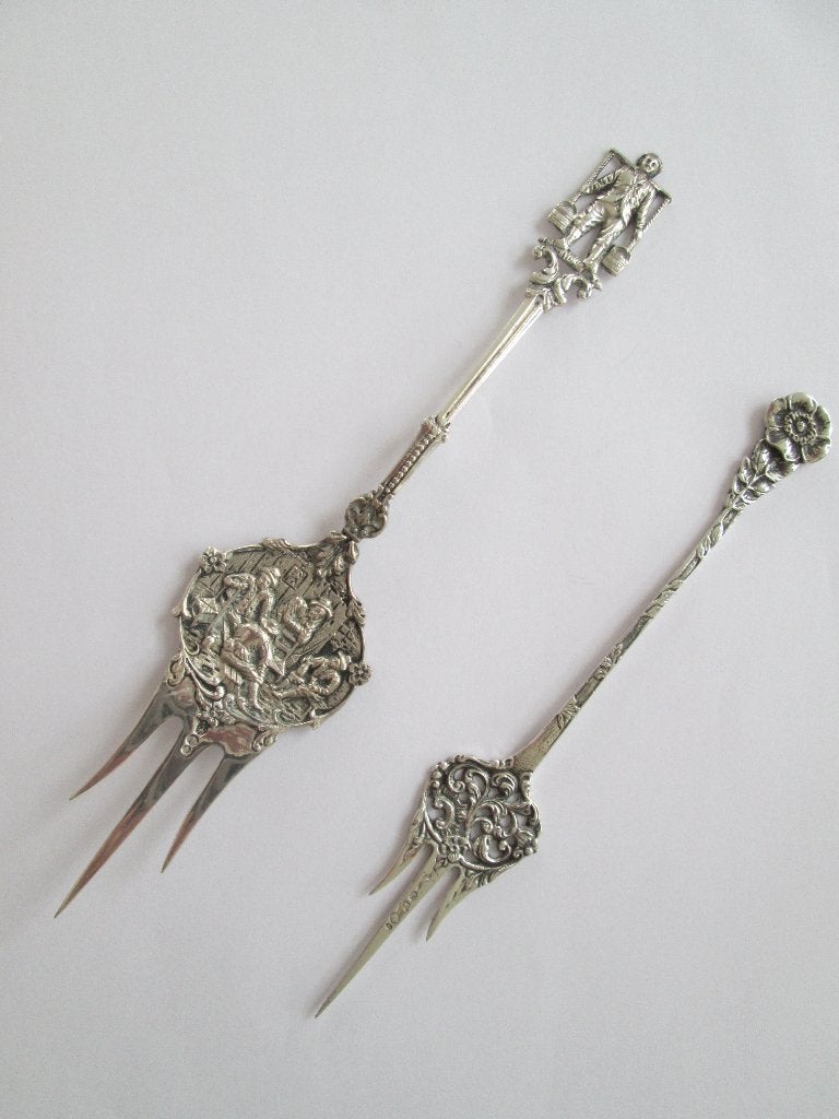 2 antiek zilveren cakeprikkers. Hooijkaas en Dahlia, Ophalen of Verzenden, Zilver