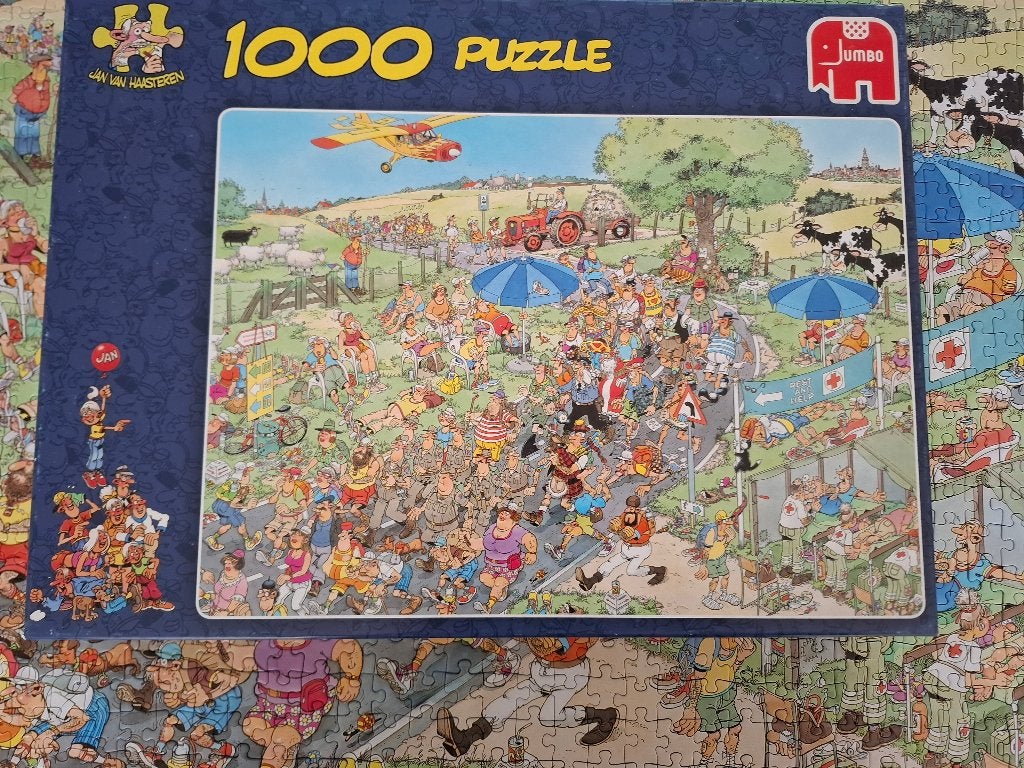 Jan van Haasteren puzzels De Mars en Zeebanket 1000 stukjes, Ophalen of Verzenden, 500 t/m 1500 stukjes, Zo goed als nieuw, Legpuzzel