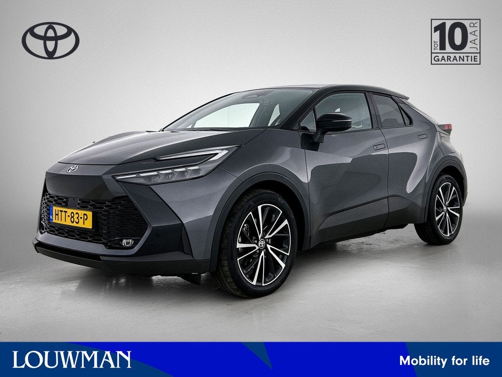 Toyota C-HR Plug-in Hybrid 220 Executive | Sportstoelen | Pa, Auto's, Toyota, 12 maanden, 4 cilinders, Leder en Stof, Automatische klimaatregeling