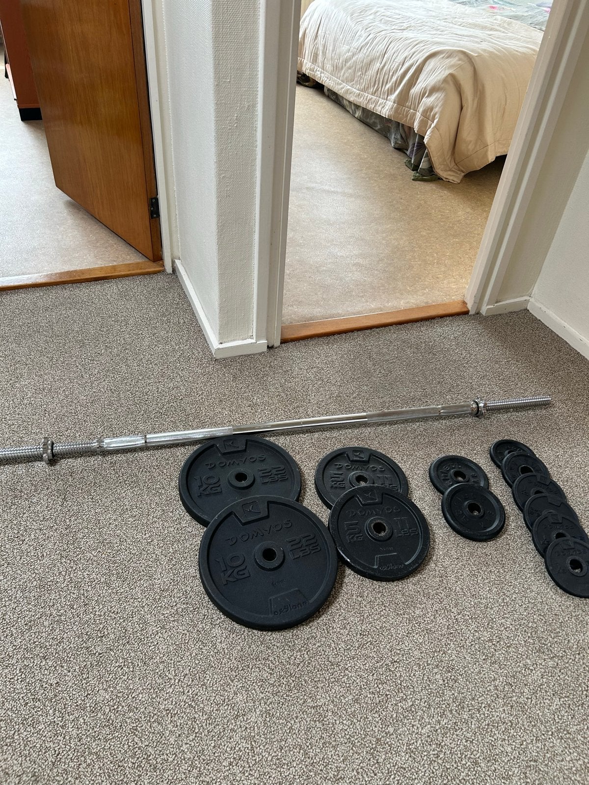 Halterstang incl gewichten / schijven totaal 50kg nieuw., Ophalen of Verzenden, Gebruikt, Armen, Halterset