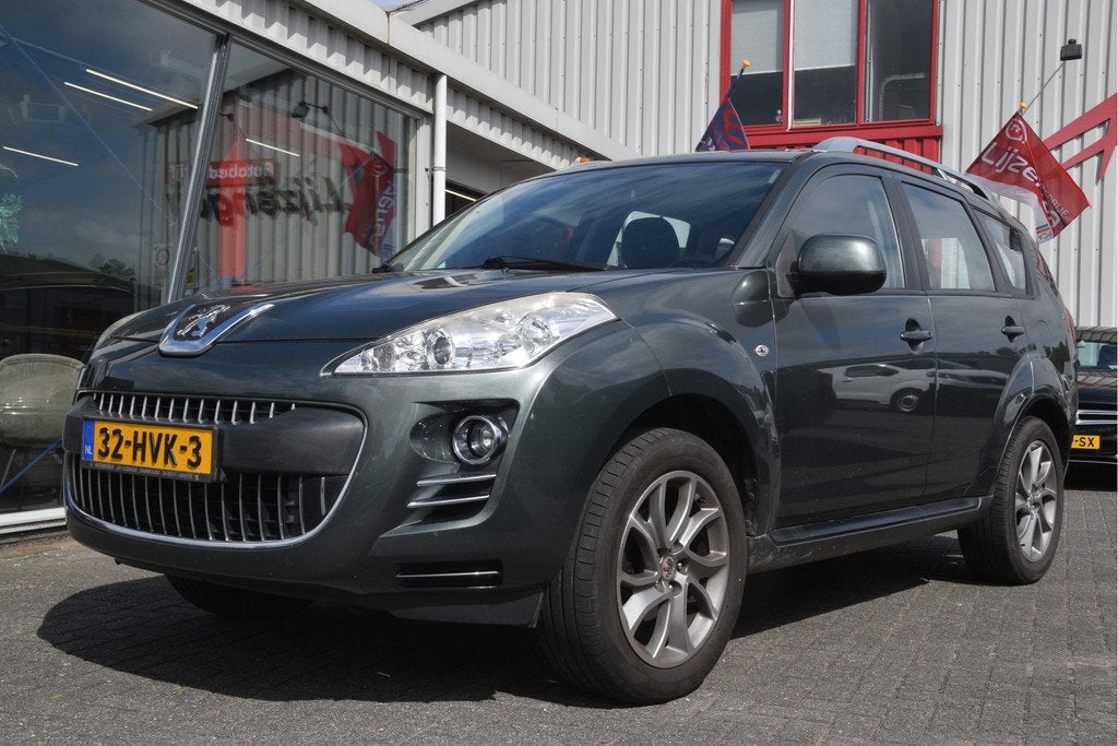Peugeot 4007 2.4 ST 5p. 4WD | Airco | LMV | PDC | Trekhaak, Auto's, Peugeot, Stof, Gebruikt, 4 cilinders, Bedrijf