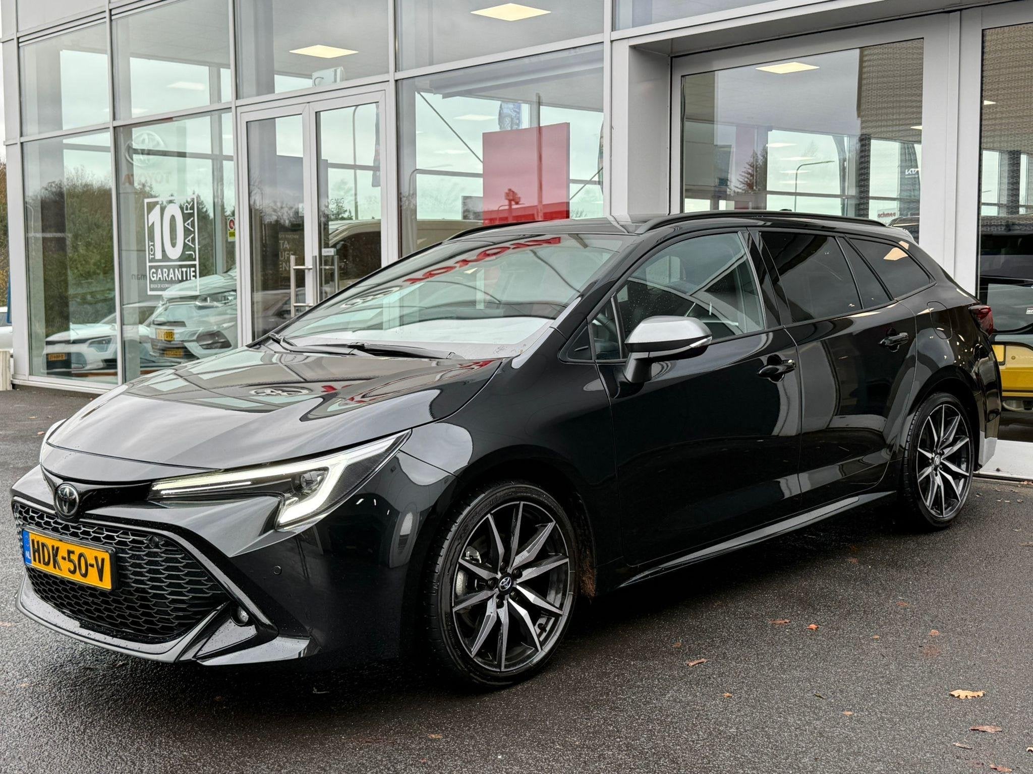 Toyota Corolla Touring Sports Hybrid 200 GR Sport Plus Schui, Auto's, Gebruikt, 4 cilinders, Corolla, Lichtsensor