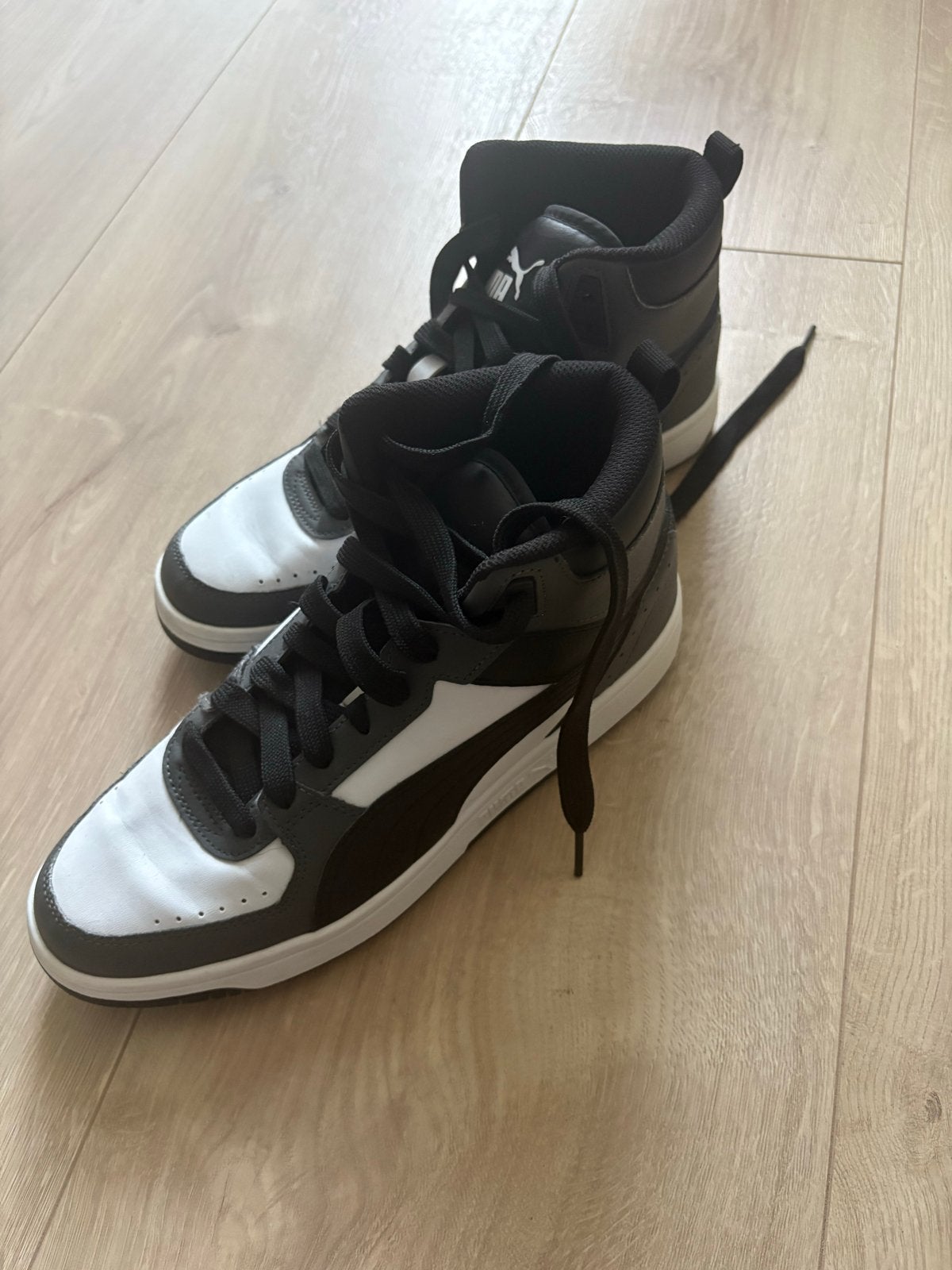 Puma Rebound Joy, Zwart, Ophalen of Verzenden, Zo goed als nieuw, Veterschoenen