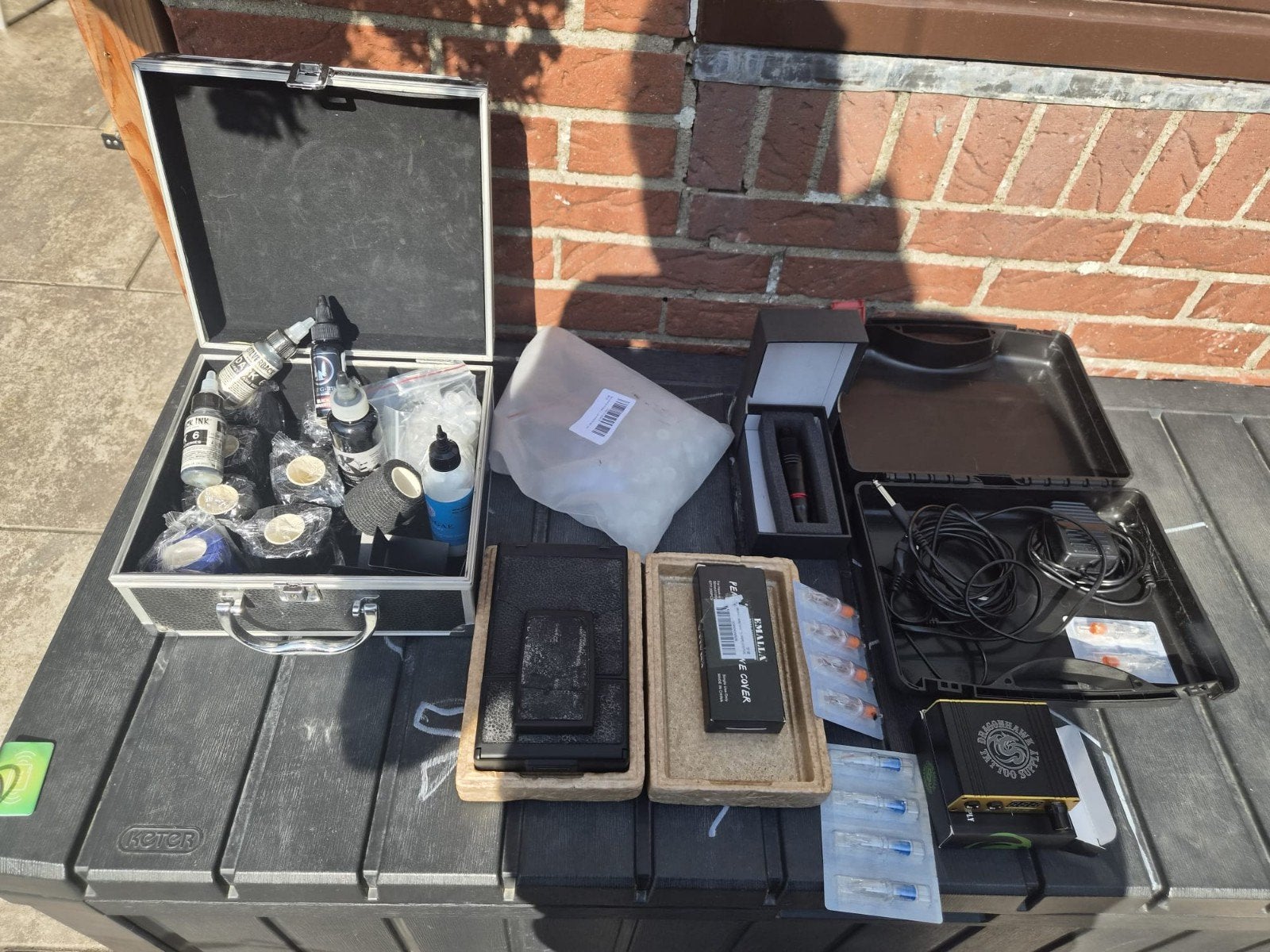 Tatoeage set compleet, Ophalen