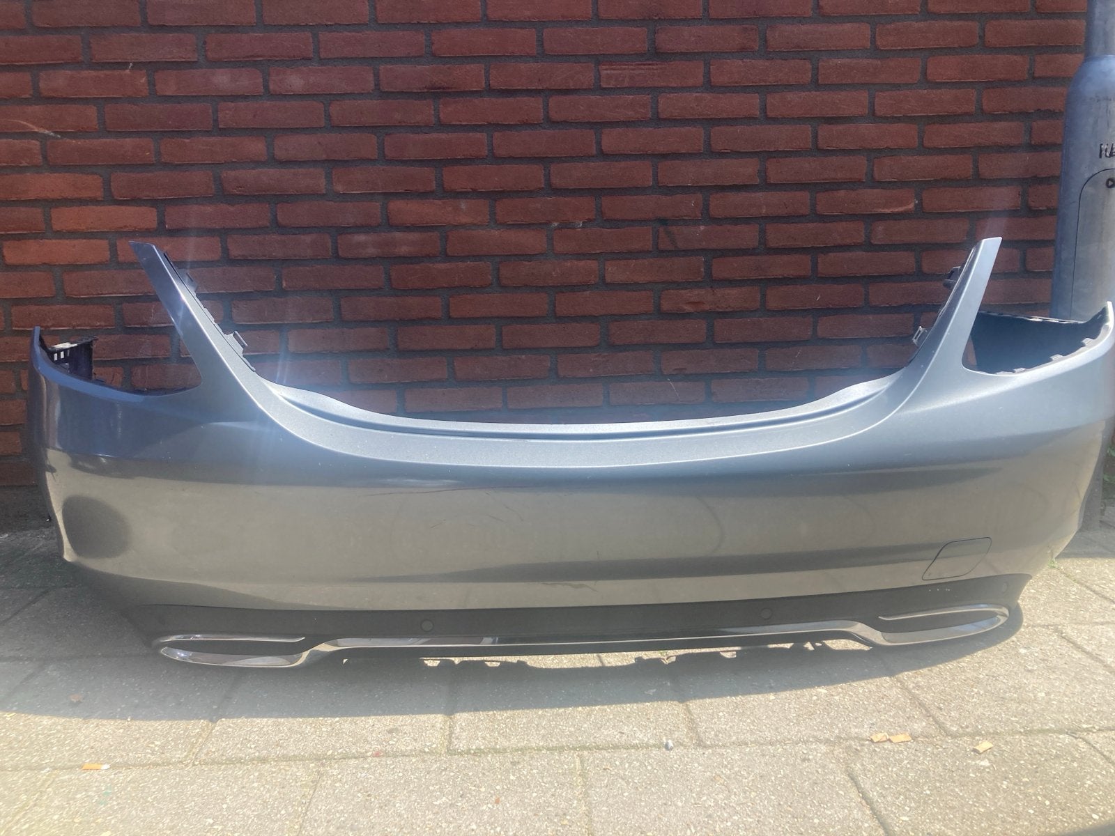 Mercedes-Benz C-Klasse W205  A.M.G Achterbumper Grijs, Auto-onderdelen, Gebruikt, Mercedes-Benz, Ophalen of Verzenden, Achter