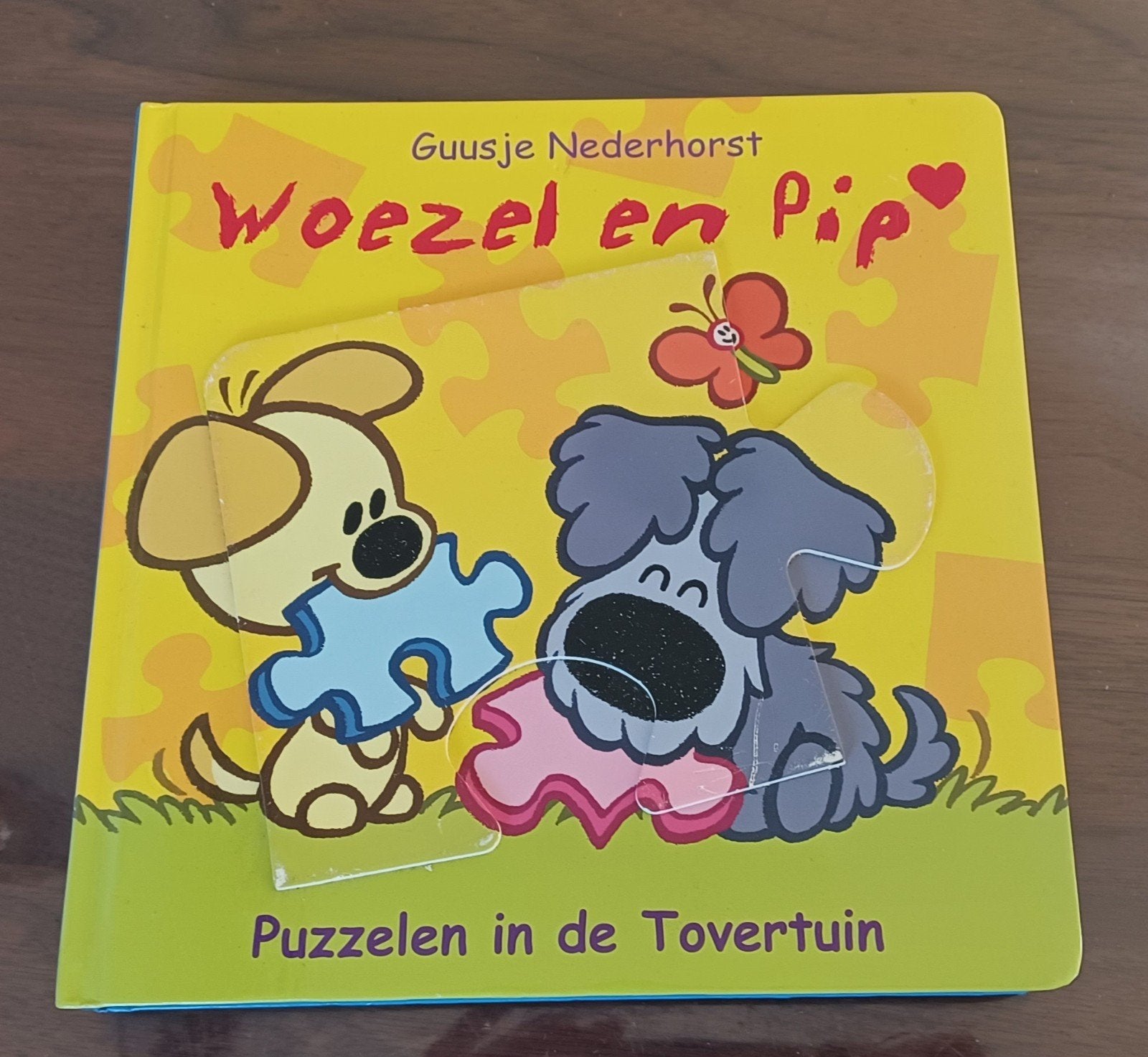 Woezel en Pip: Puzzelen in de Tovertuin (Guusje Nederhorst), Ophalen of Verzenden, Zo goed als nieuw, 2 tot 3 jaar, Uitklap-, Voel- of Ontdekboek