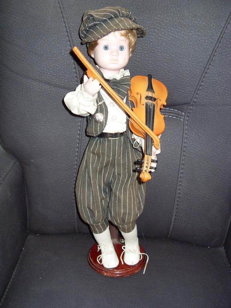 porseleinen pop van een violist. beweegt + muziek vintage, Ophalen of Verzenden, Zo goed als nieuw, Pop