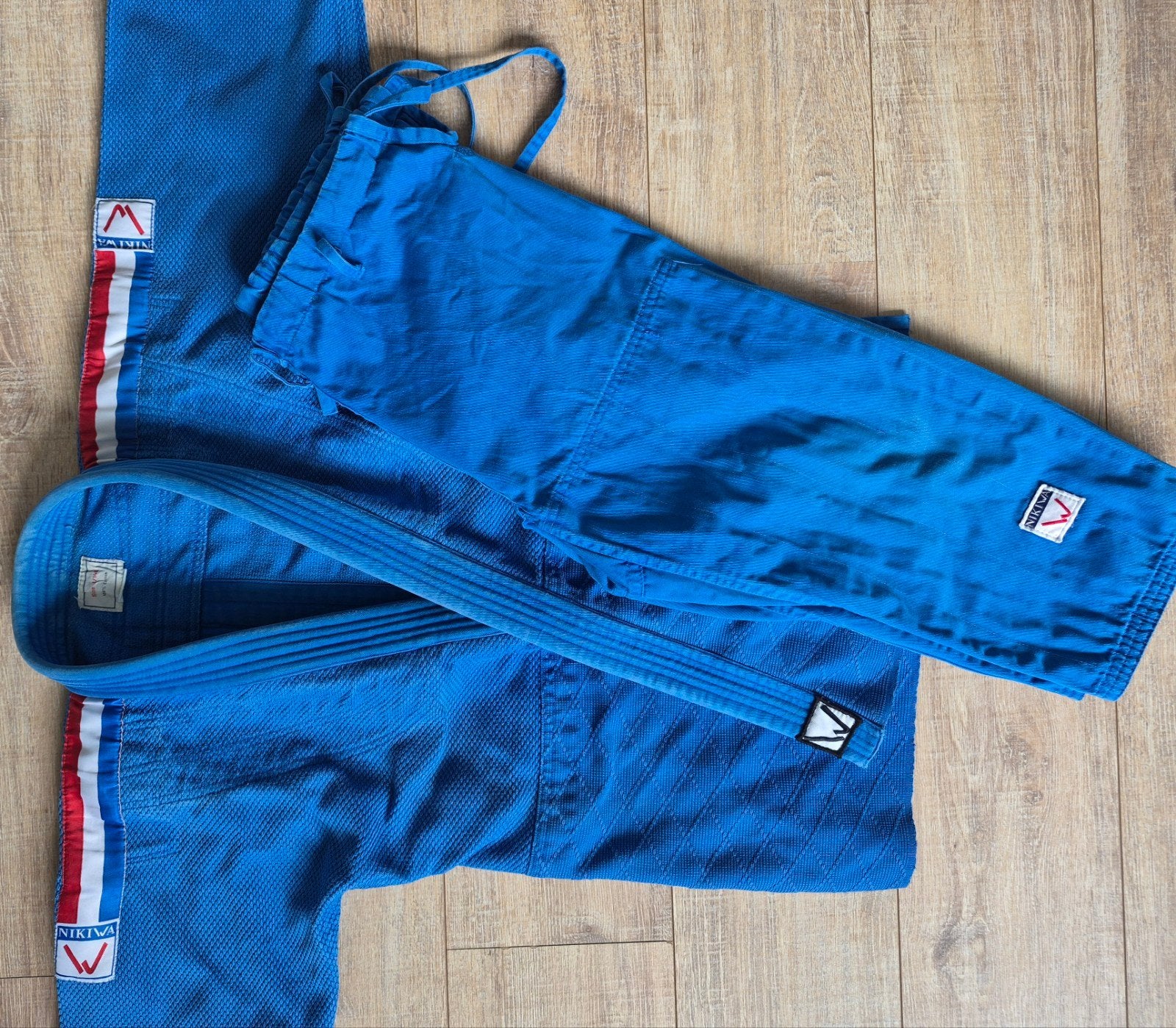Blauw Judo Pak Nikiwa - Maat 140, Sport en Fitness, Vechtsporten en Zelfverdediging, Ophalen, Gebruikt, Maat XS of kleiner, Judo