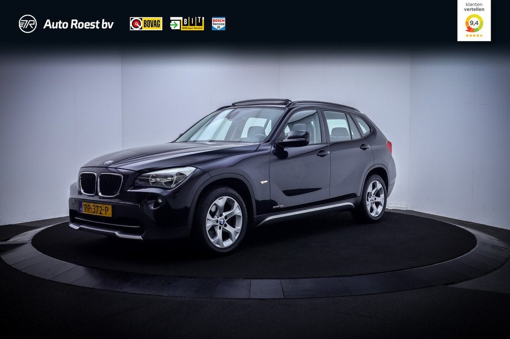 BMW X1 18i Executive PANO | LEDER | STOELVERW | NAVI | CLIMA, X1, Euro 5, Zwart, 4 cilinders