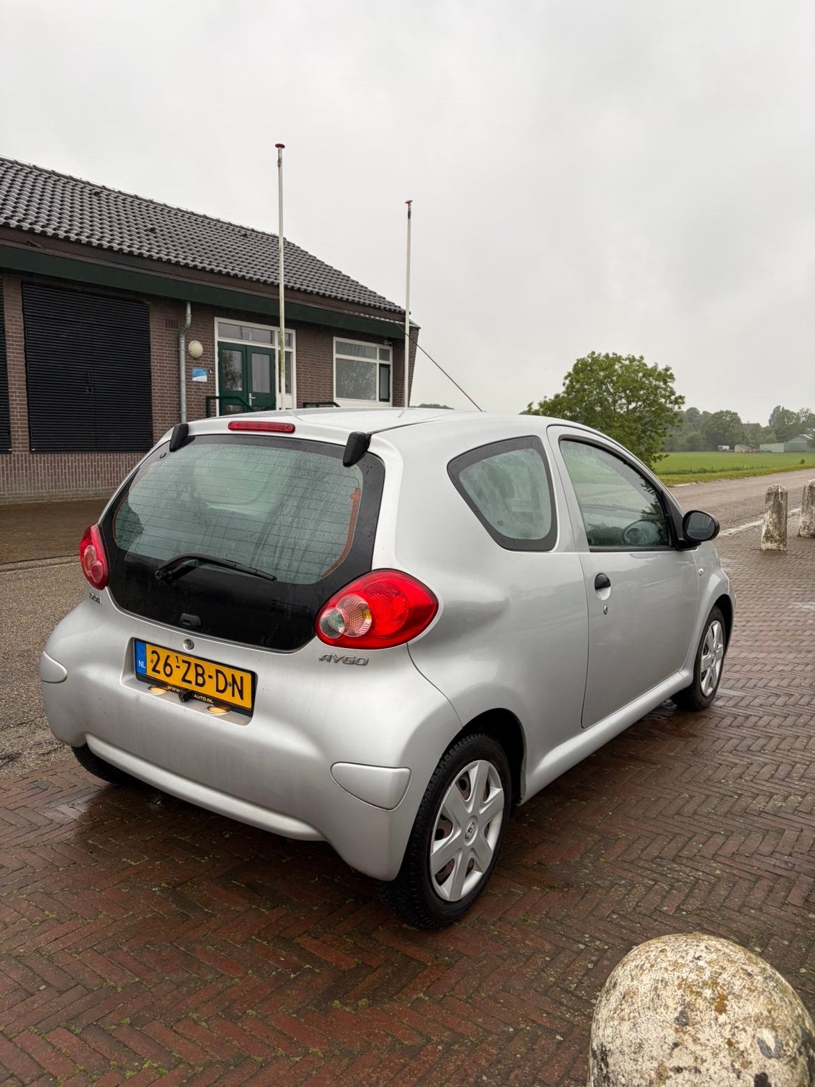 Toyota Aygo 1.0 12V Vvt-i 3DRS MMT 2007 Grijs, Auto's, Voorwielaandrijving, 4 stoelen, 68 pk, Origineel Nederlands
