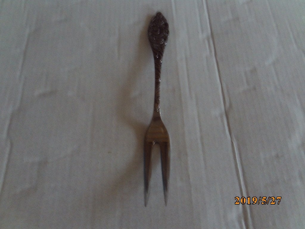 sola vleesvorkje met bloemmotief, Ophalen of Verzenden, Gebruikt, Rvs of Chroom