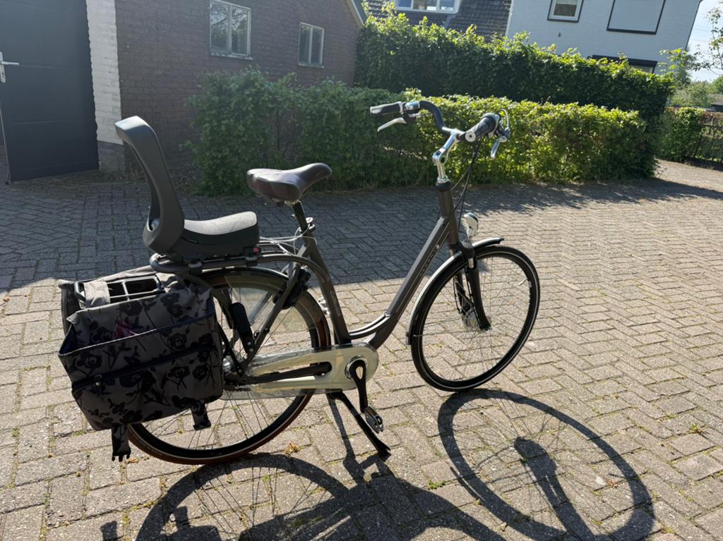 Sparta damesfiets met kinderzitje en fietstassen, Ophalen, Sparta, Gebruikt, Dubbele standaard