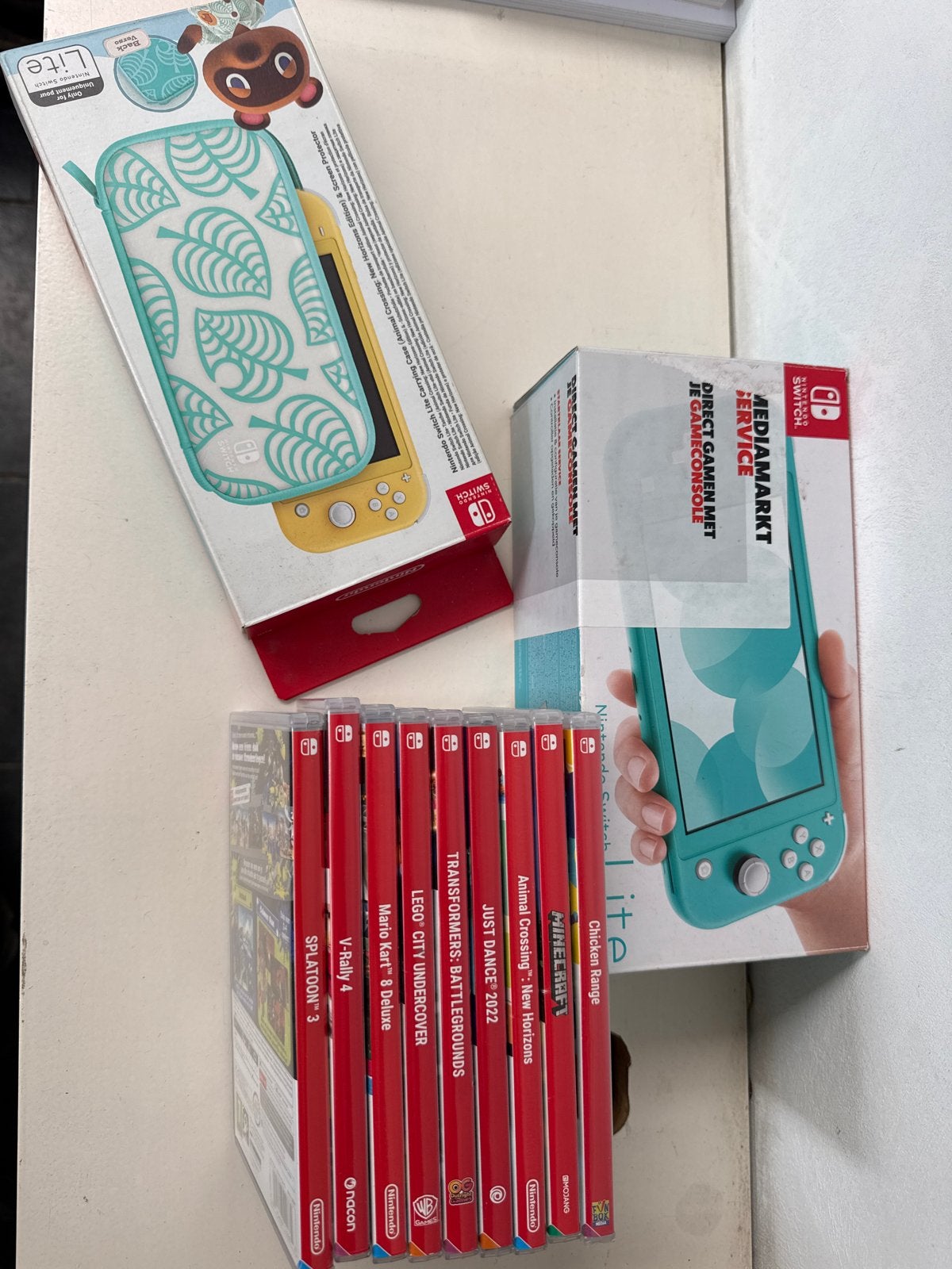Nintendo Switch Lite met hoes en 8 spellen, Met games, Ophalen of Verzenden, Zo goed als nieuw, Switch Original