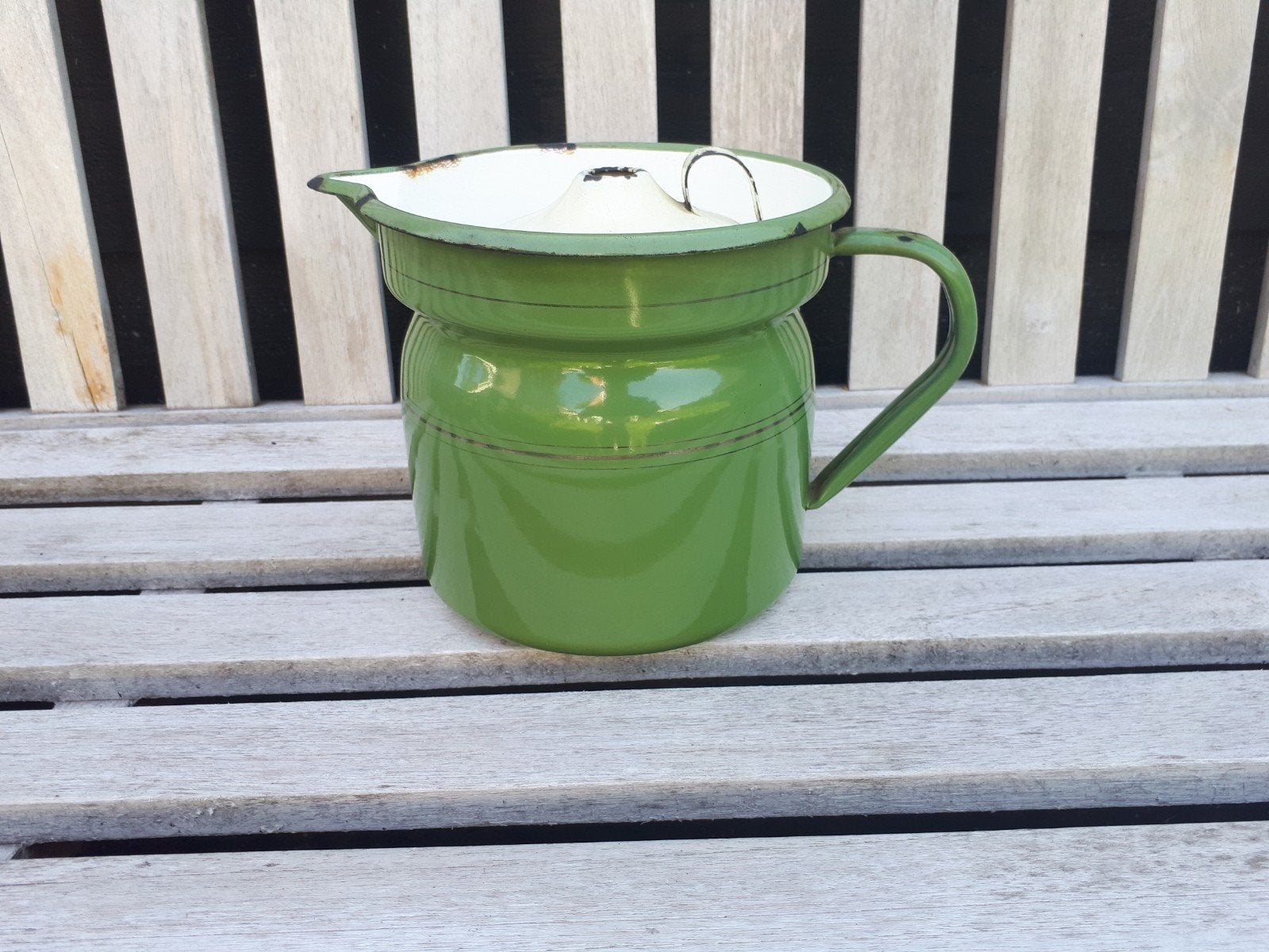Emaille melk kan., Ophalen