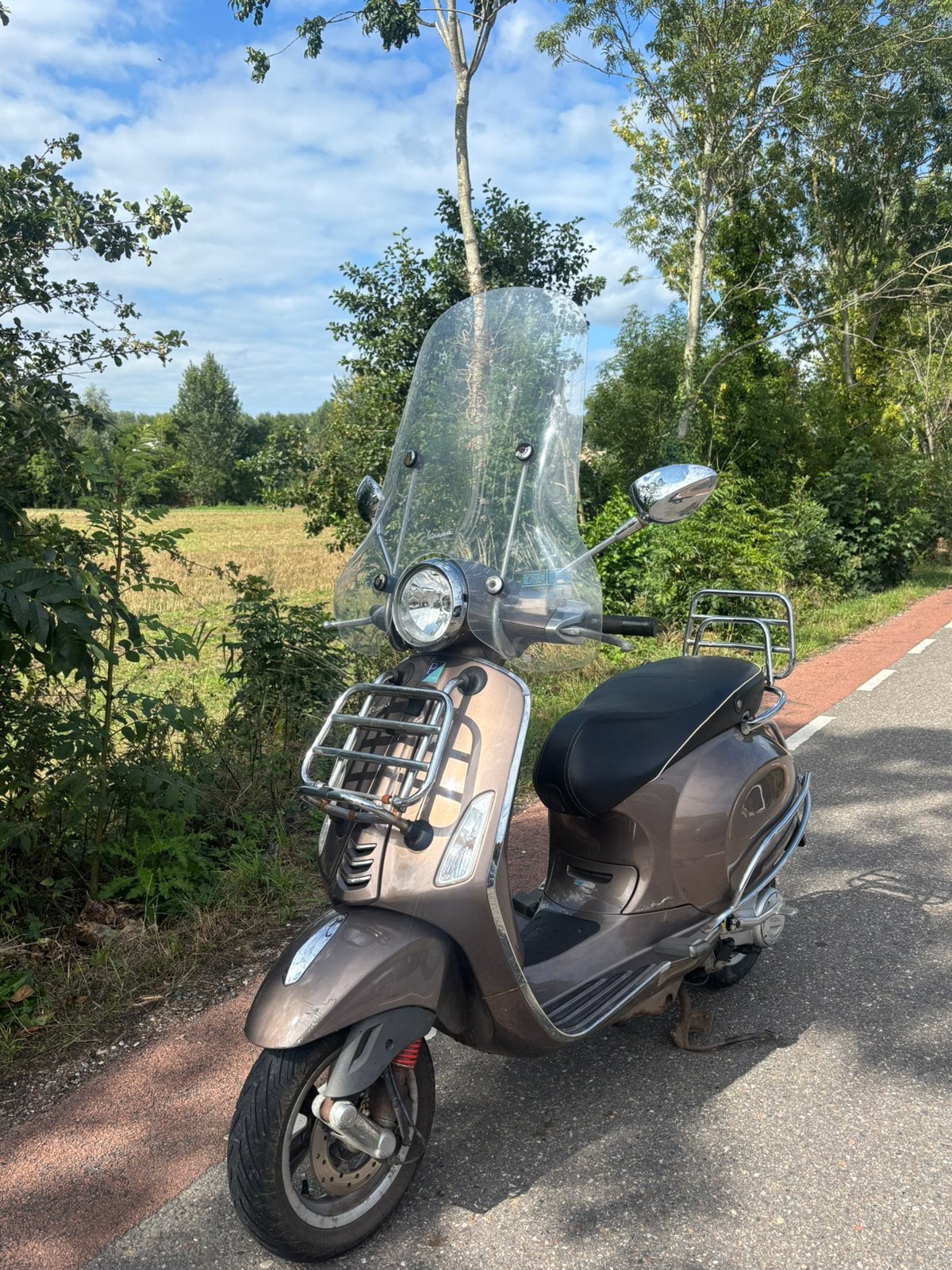 Vespa Primavera - Maronne bruin, Fietsen en Brommers, Scooters | Vespa, Ophalen, Gebruikt, Overige modellen, Benzine