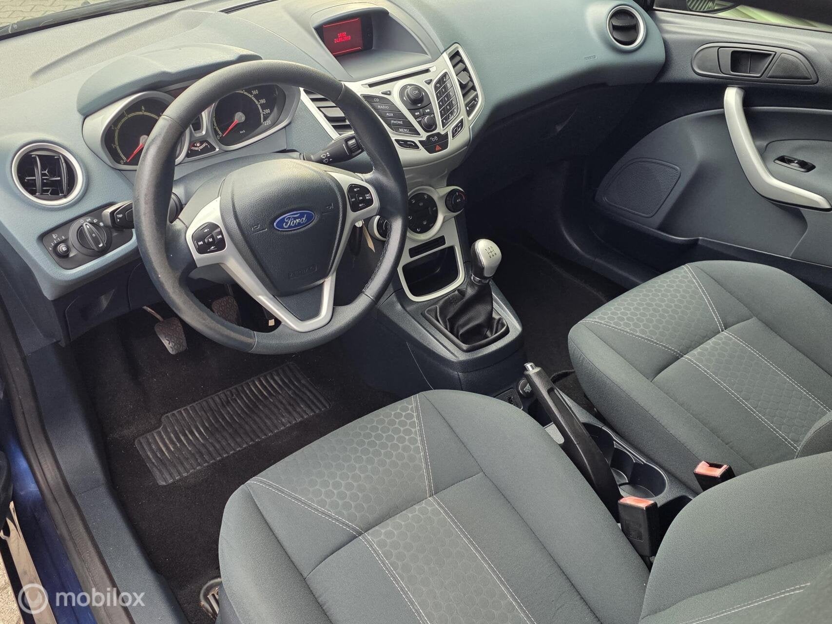 Foto 11 van Ford Fiesta 1.25 Titanium|Airco|2x Sleutel|PDC|