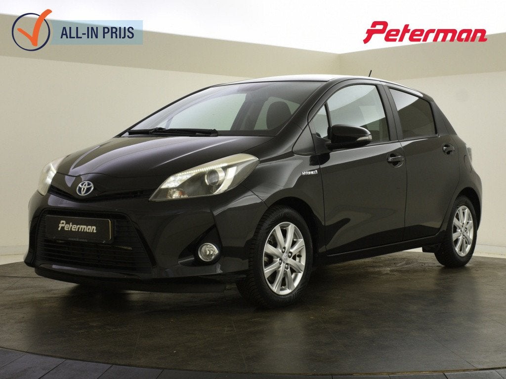 Toyota Yaris 1.5 Hybrid Dynamic | Navigatie | Camera | Trekh, Auto's, Automaat, 4 cilinders, 100 pk, Bedrijf
