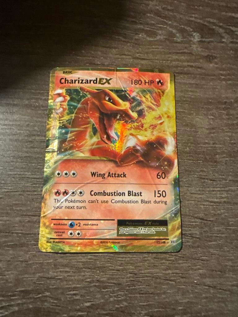 Beschadigde Charizard EX Pokémon kaart - Goedkoop!, Ophalen of Verzenden, Gebruikt, Losse kaart, Foil