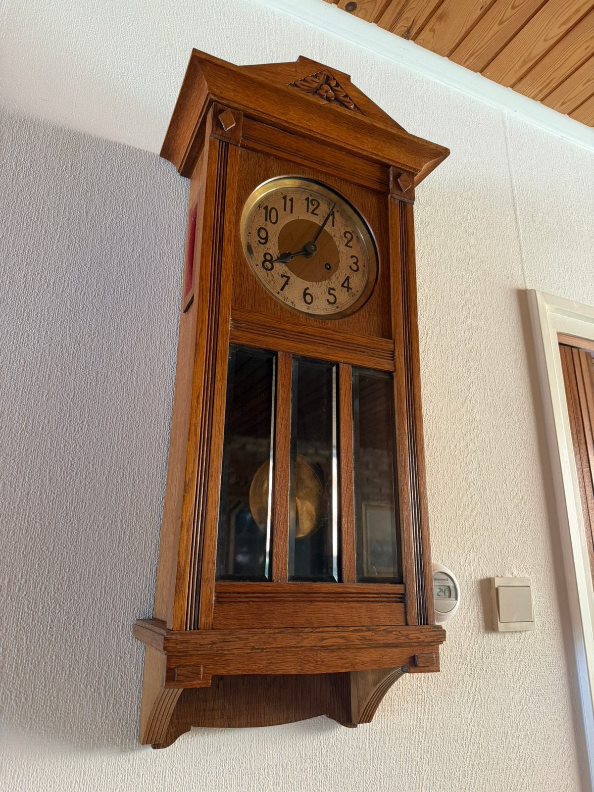 Antieke houten wandklok, Ophalen
